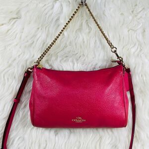 Coach Carrie Crossbody bag in pink pebble leather with gold-tone hardware